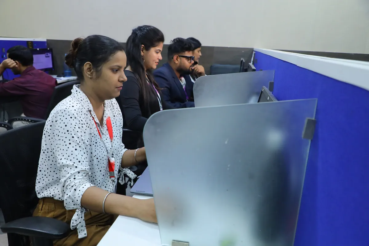 MyTasker team members working side by side on client tasks