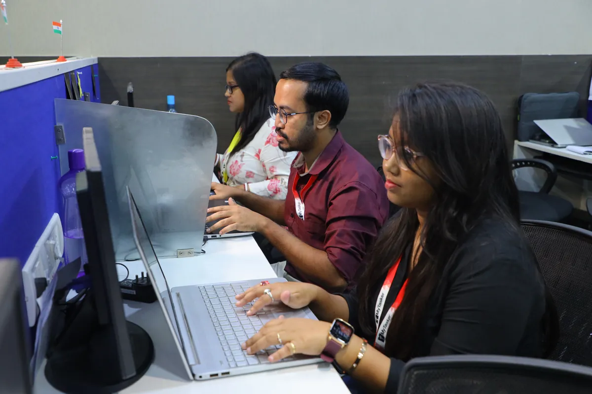 MyTasker assistants working at their desks in the Kolkata office